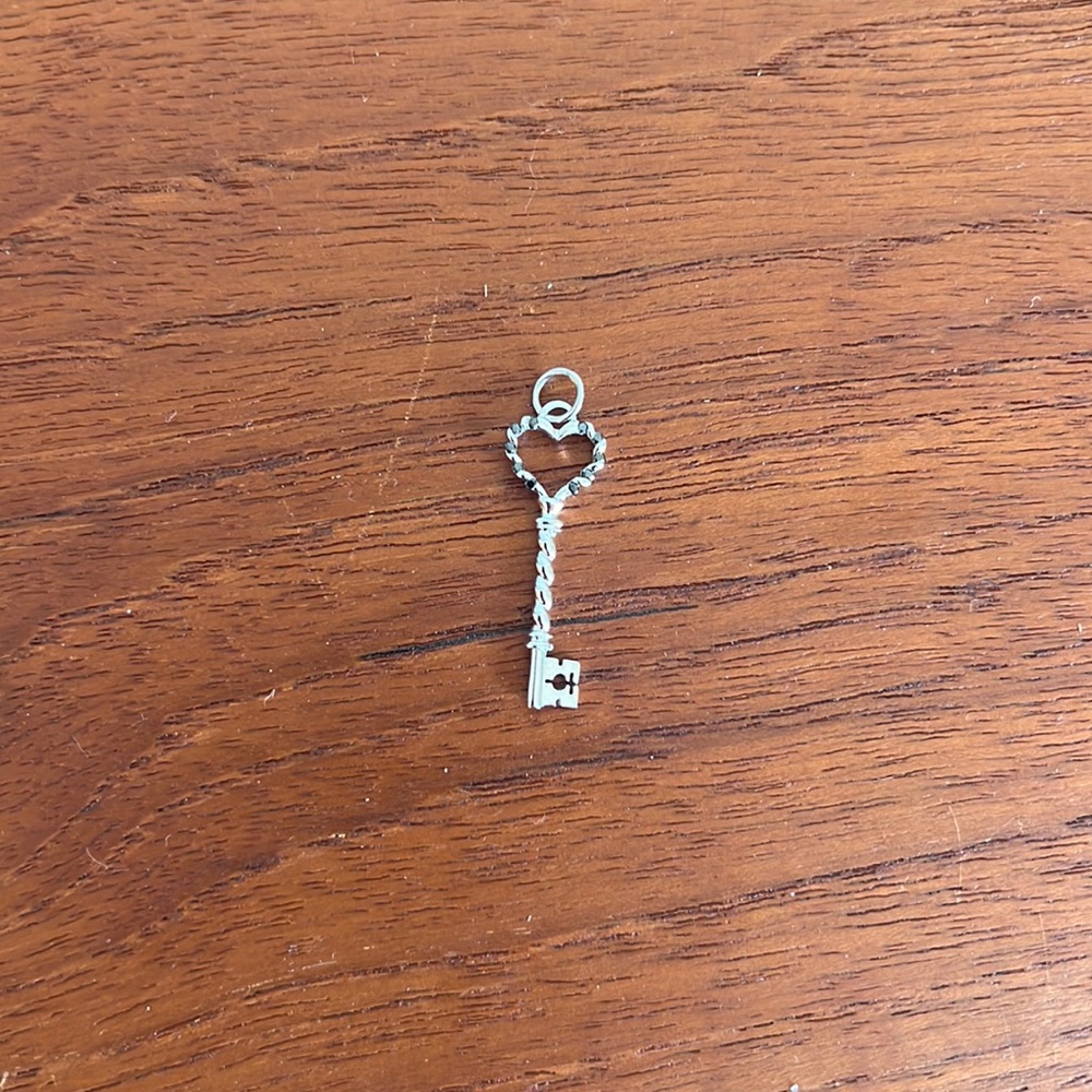 1 inch long white gold key pendant